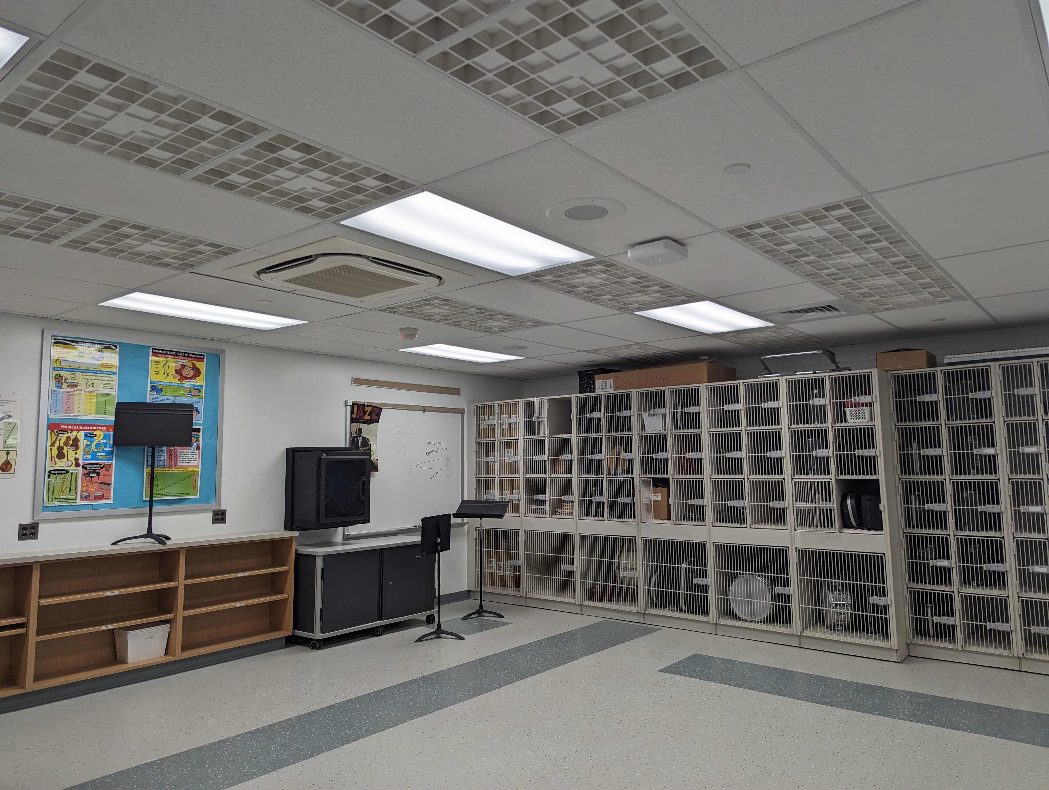 a large room with a lot of bookshelves