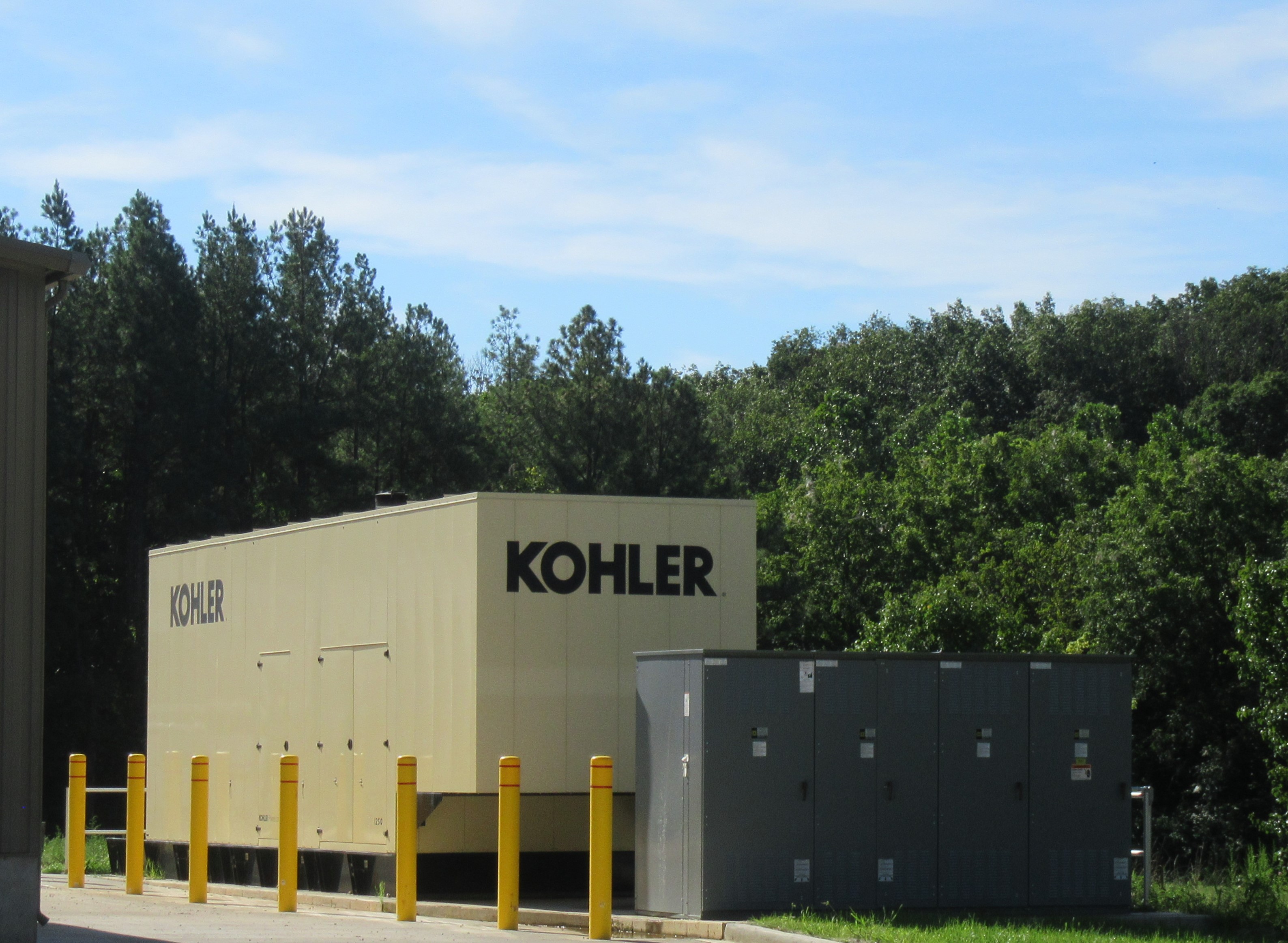 a building with a sign that says kohler on it