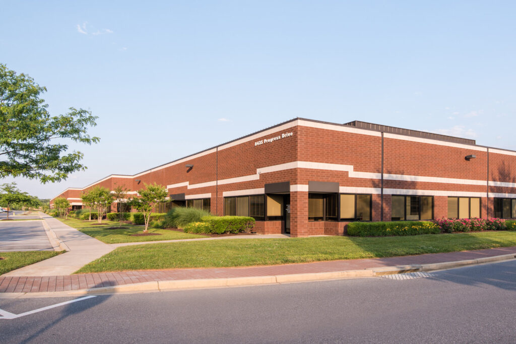 a large brick building sitting on the corner of a street